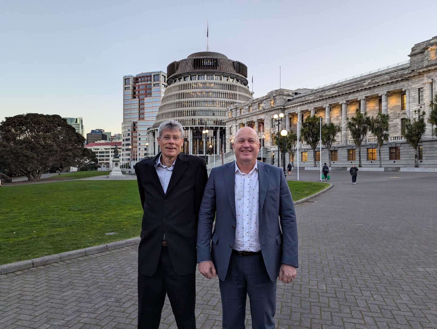 Dr Graeme Smart and Dr Adam Barker stand outside the Beehive